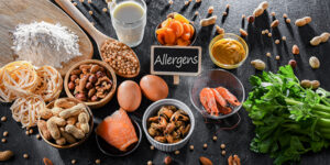 Composition with common food allergens including egg, milk, soya, nuts, fish, seafood, wheat flour, mustard, dried apricots and celery